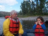 Rachel and Grandpa Stig slow rafting on Snake River in Grand Teton National Park.