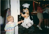 Jacob meets a Goofy chef at Character Breakfast in Disney World