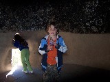 David inside a Native American cabe dwelling at Bandalier Canyon, New Mexico