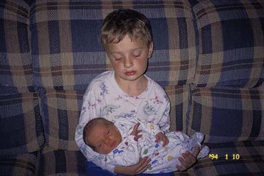 Jacob holding sister Rachel