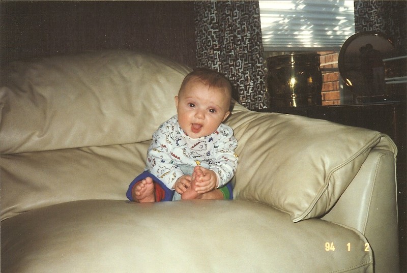 Jacob now knows how to sit in a sofa