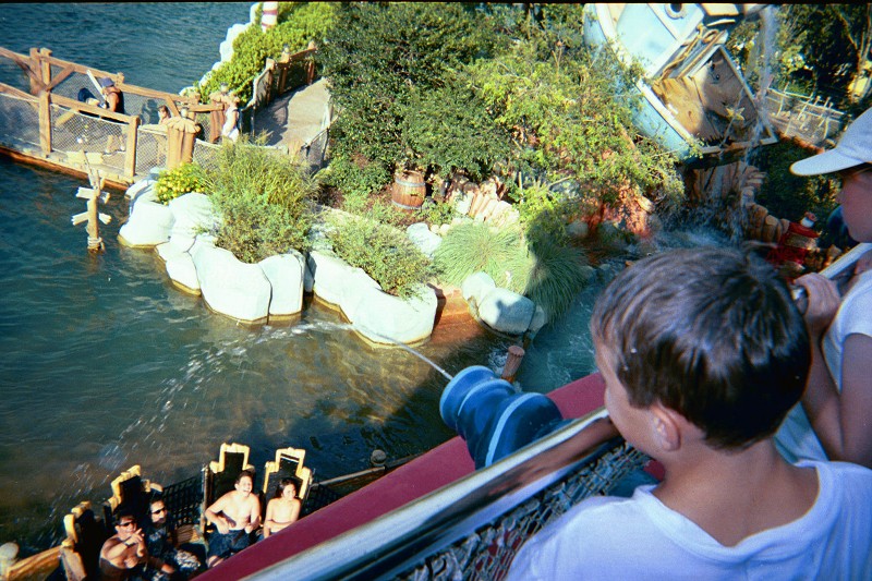 Shooting water guns at Adventure Island