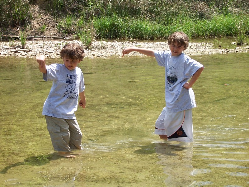 Dinosaur footprints in the Paluxy river, David and Jacob