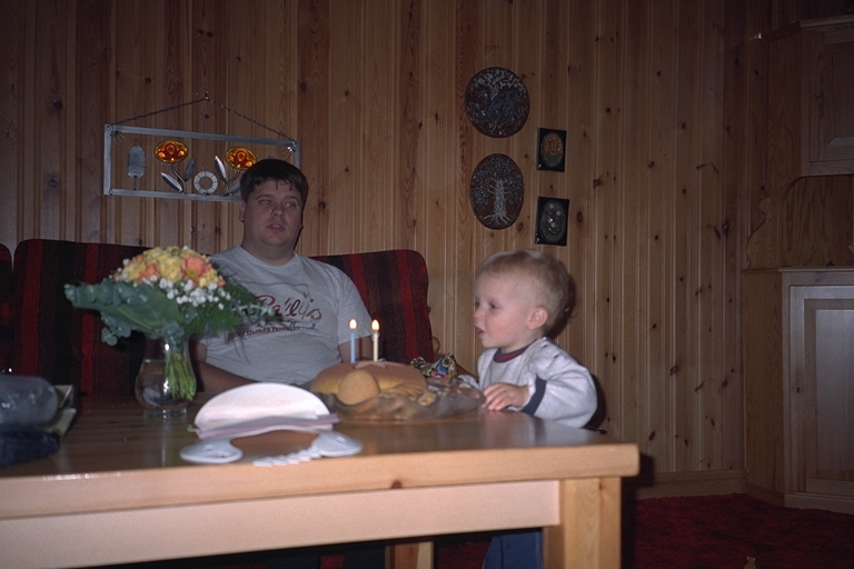 Jaconb blows the candles on his second birthday