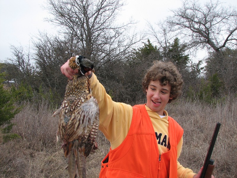 Kelan with Pheasant. This time the boys got 64 birds