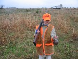 This Quail is still flapping its wings. Jackson and Jacob went hunting together This Quail is still flapping its wings. Jackson and Jacob went hunting together