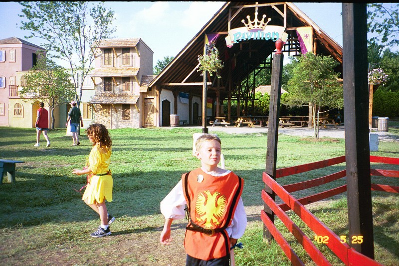 Jacob and Anna and one of the many eataries in the background