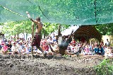 The mud wrestling show, one of the funniest shows at Scarborough Faire. It occurs in the evil mud pit The mud wrestling show, one of the funniest shows at Scarborough Faire. It occurs in the evil mud pit
