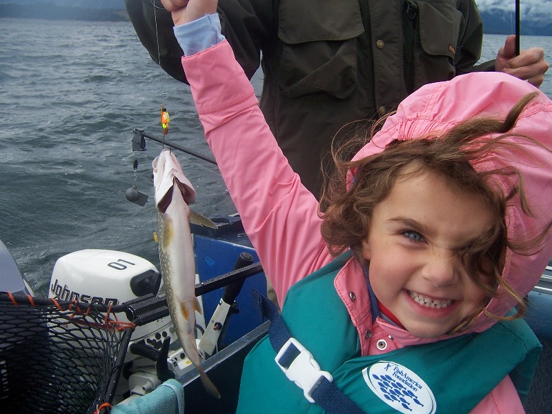 Rachel caught a trout in Jackson Lake in Grand Teton National Park, Wyoming.