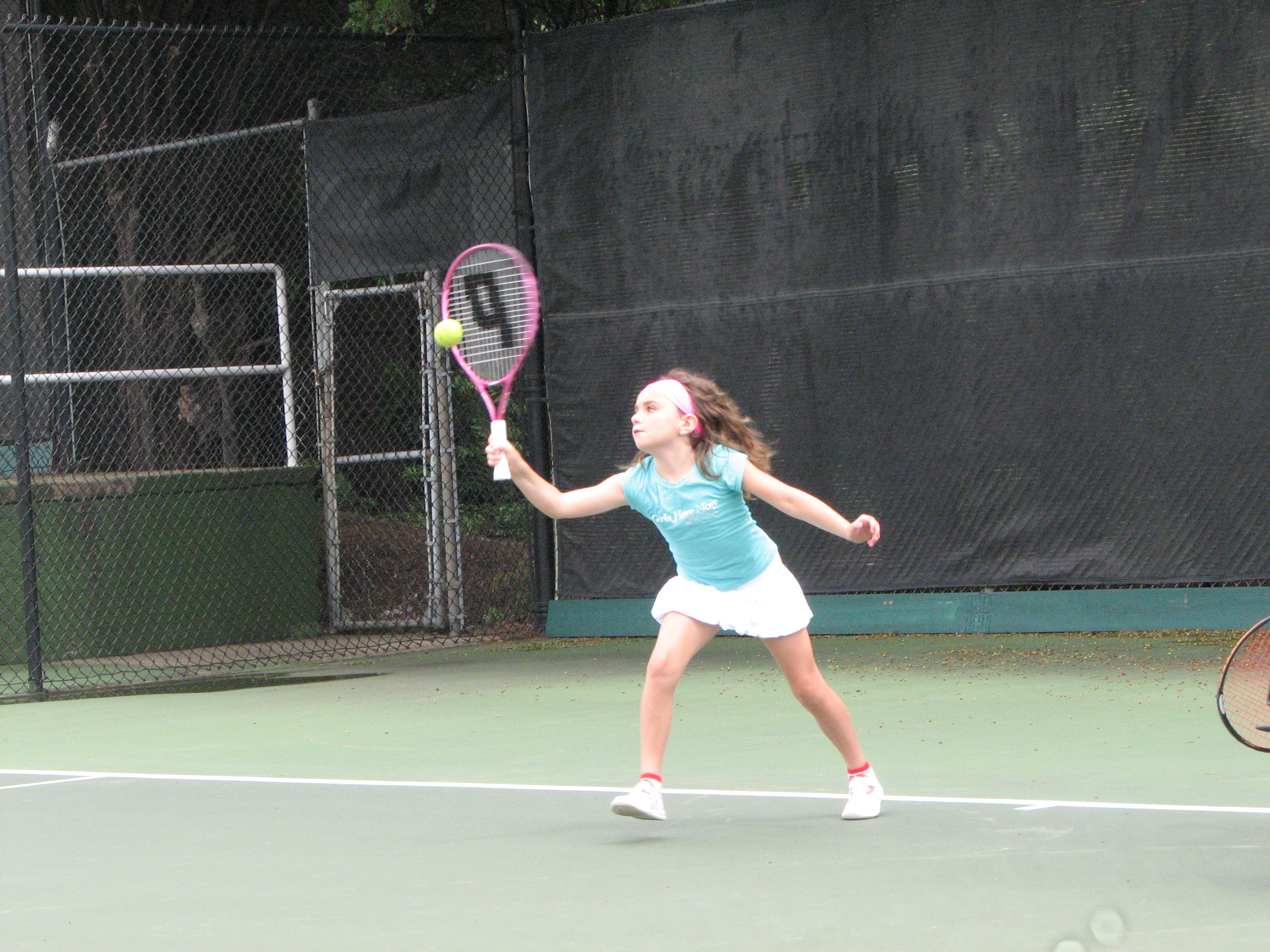 Rachel playing Tennis