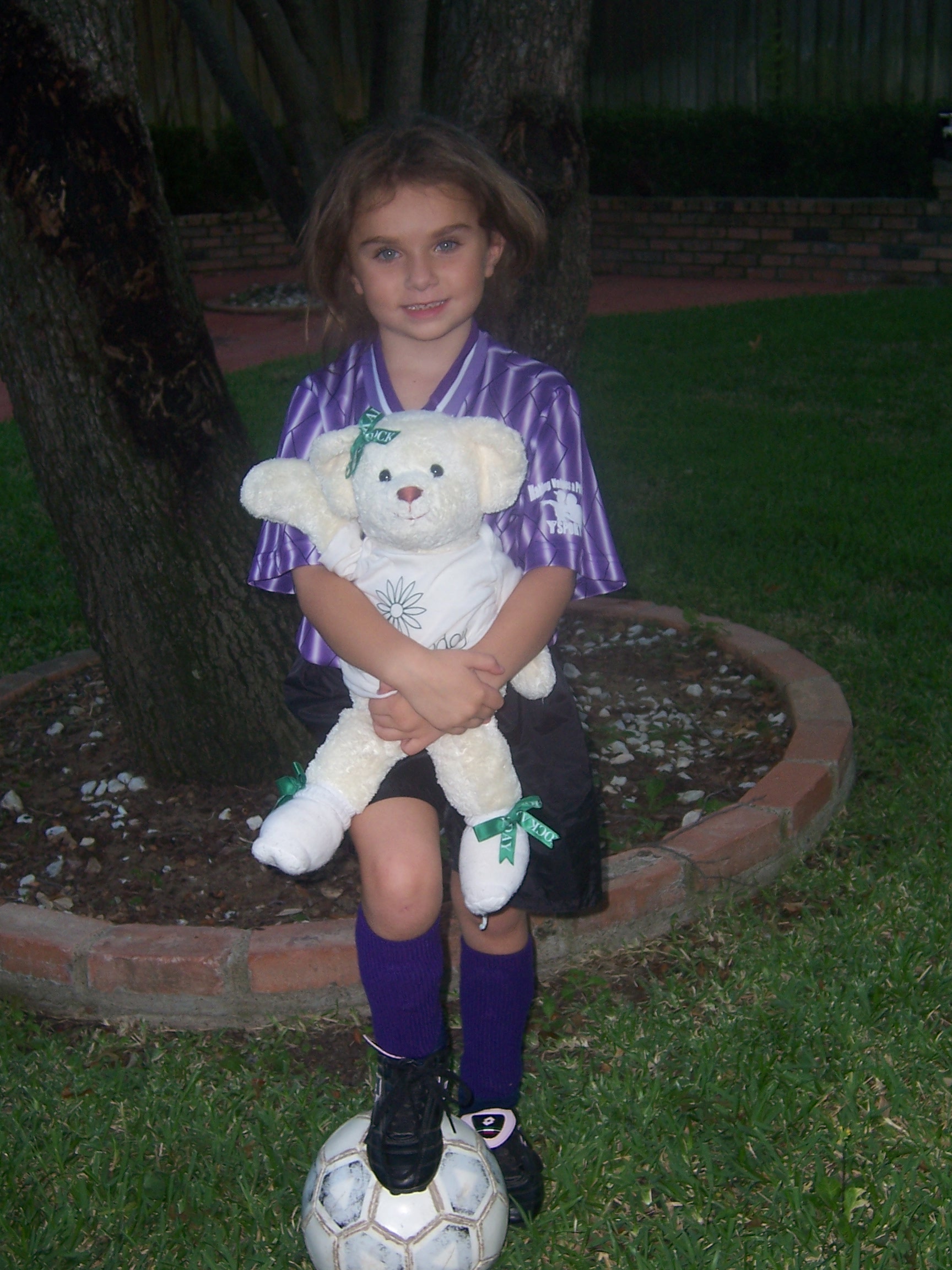 Rachel with the teddy and the soccer ball.