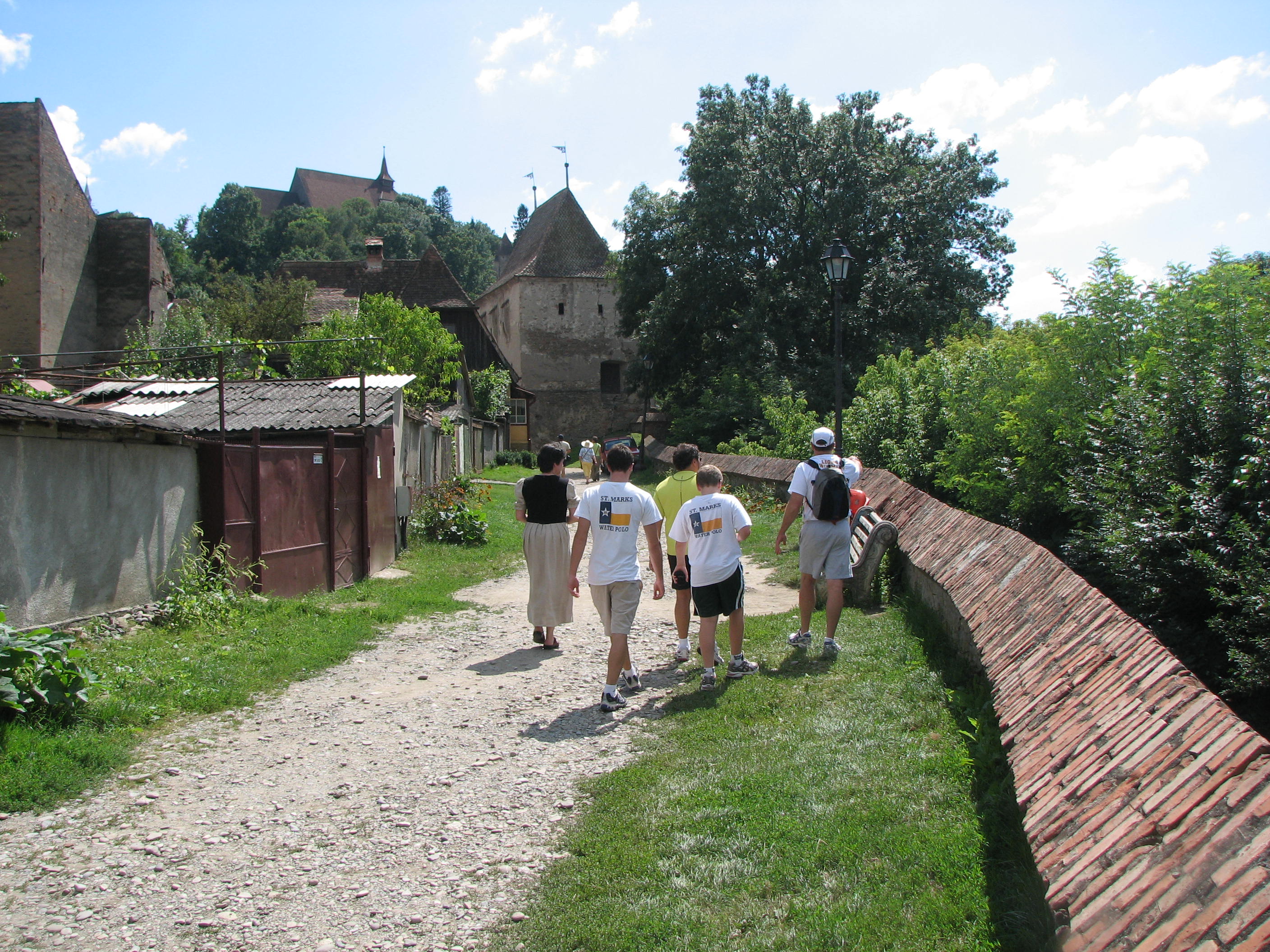 The city was surrounded by a wall with nine towers.