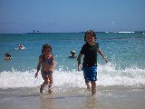 David and Rachel running on the beach