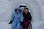 Rachel and David in Ice Hotel Window (two of our kids)