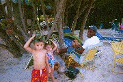 David and Rachel and the handicraft man on the Beach