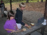 Alma and Maria baking bread