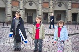 The castle of the Swedish King, the kids and a guard The castle of the Swedish King, the kids and a guard